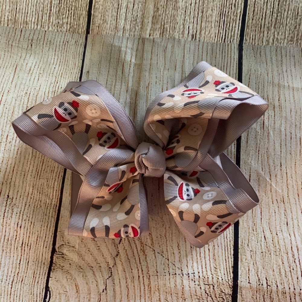 Handmade sock monkey bow